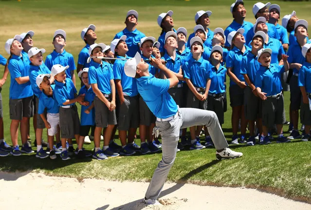 Jordan Spieth of the United States plays a bunker shot as he hosts a golf clinic for junior Australian golfers ahead of the 2015 Australian Open at The Australian Golf Course on November 24, 2015 in Sydney, Australia. (Photo by Matt King/Getty Images)