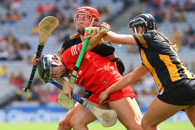 Cork's Amy O’Connor is tackled by Tiffanie Fitzgerald and Kellyann Doyle of Kilkenny during the All-Ireland Senior Camogie Championship quarter-final at Croke Park, Dublin on July 9, 2023. (Photo by Bryan Keane/Inpho)