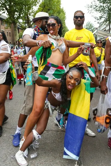 Performers, revellers and carnival goers enjoy the annual Notting Hill Carnival in London, Britain on August 27, 2018. (Photo by Dinendra Haria/Alamy Live News)