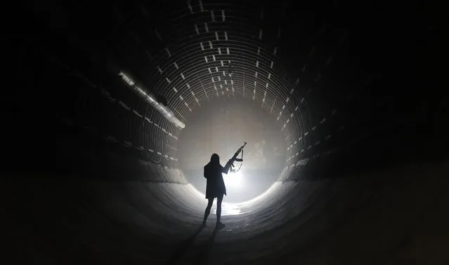 A visitor attends the nuclear defense Bunker 703, at a depth of 43 meters, in Moscow, Russia, 25 April 2021. The recently declassified facility of Cold War period, the bunker was in use by the ministry of Foreign Affairs until 2005. On 2018 was converted into the museum the Bunker 703. (Photo by Maxim Shipenkov/EPA/EFE)