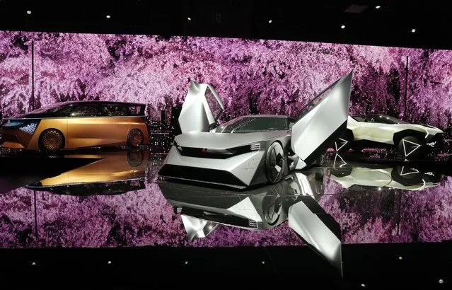 Japanese carmaker Nissan Motor Co. Ltd., unveils its Nissan Hyper EV concept vehicles, the minivan Nissan “Hyper Tourer” (L), Nissan “Hyper Force” (C) and compact crossover Nissan “Hyper Punk” (R), during a presentation at the Japan Mobility Show 2023 in Tokyo, Japan, 25 October 2023. The Japan Mobility Show 2023 will be open to the general public from 28 October to 05 November 2023. (Photo by Kimimasa Mayama/EPA)