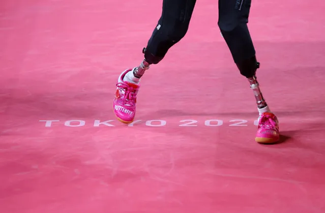 Kubra Korkut of Turkey in action against Viktoriia Safonova of the Russian Paralympic Committee during Class 7 Group B Women's Singles Table Tennis Match on day 2 of the Tokyo 2020 Paralympic Games at Tokyo Metropolitan Gymnasium on August 26, 2021 in Tokyo, Japan. (Photo by Ivan Alvarado/Reuters)