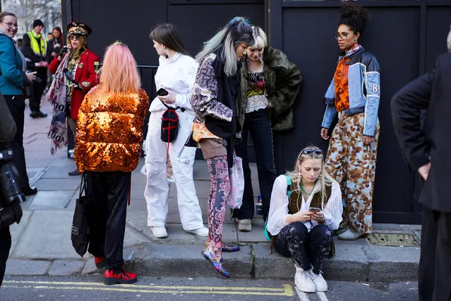 Fashionistas gather outside the BFC Showspace during London Fashion Week Women's A/W19 in London, Britain February 15, 2019. (Photo by Henry Nicholls/Reuters)