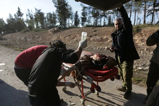 Medics tend to the wounds of a rebel fighter who was injured from a mine on the outskirts of the northern Syrian town of al-Bab, Syria January 28, 2017. (Photo by Khalil Ashawi/Reuters)