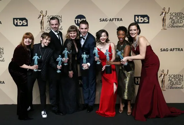 The cast of “Orange is the New Black” poses with the awards they won for Outstanding Performance by an Ensemble in a Comedy Series backstage at the 23rd Screen Actors Guild Awards in Los Angeles, California, U.S., January 29, 2017. (Photo by Mario Anzuoni/Reuters)