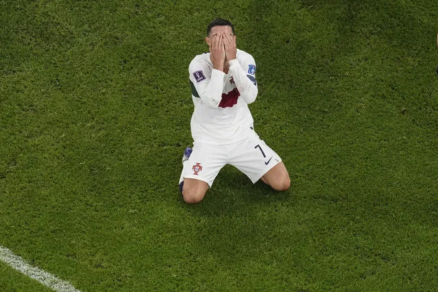 Portugal's Cristiano Ronaldo, reacts after he failed to score during the World Cup quarterfinal soccer match between Morocco and Portugal, at Al Thumama Stadium in Doha, Qatar, Saturday, December 10, 2022. (Photo by Thanassis Stavrakis/AP Photo)