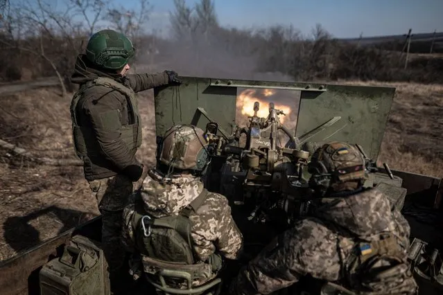 Ukrainian soldiers prepare artillery at their fighting position, as the war between Russia and Ukraine has been going on for the last two years, in the direction Bakhmut, Donetsk Oblast, Ukraine on March 02, 2024. (Photo by Diego Herrera Carcedo/Anadolu via Getty Images)