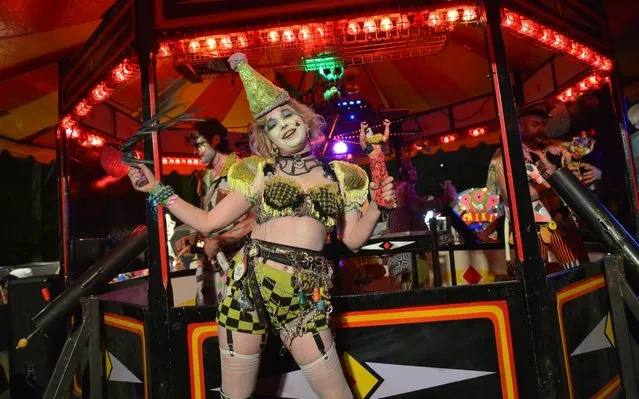 An entertainer performs at the Unfairground during day two of Glastonbury Festival at Worthy Farm, Pilton on June 27, 2019 in Glastonbury, England. The festival, founded by farmer Michael Eavis in 1970, is the largest greenfield music and performing arts festival in the world. Tickets for the festival sold out in just 36 minutes as it returns following a fallow year. (Photo by Jim Dyson/Getty Images)