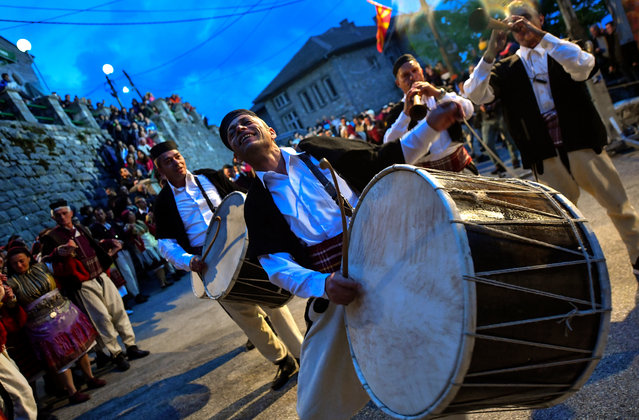 The drummers perform the night before a wedding ceremony in the village of Galicnik some 150 km west of the capital Skopje, Republic of North Macedonia, 13 July 2019. Every year the villagers of Galicnik celebrate a public summer wedding on the Orthodox day of the Patron Saint Petrovden (St. Peter's day). In this centuries-old tradition many rituals such as music and dances are performed. (Photo by Georgi Licovski/EPA/EFE)