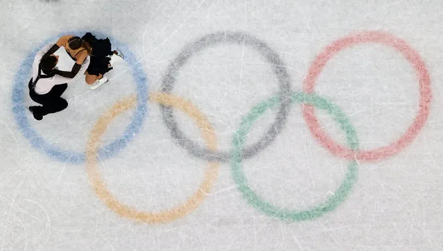 Oleksandra Nazarova and Maksym Nikitin of Ukraine skate during the Ice Dance Rhythm Dance Figure Skating on day 8 of the Beijing 2022 Winter Olympic Games at Capital Indoor Stadium on February 12, 2022 in Beijing, China. (Photo by Evelyn Hockstein/Reuters)