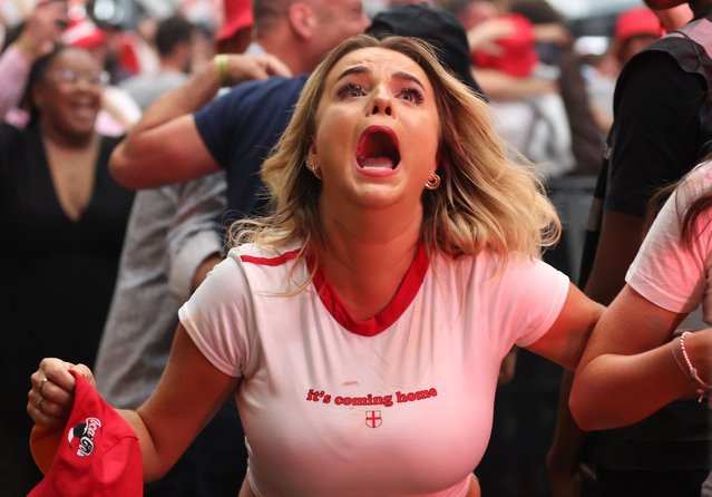 England fans at BOXPark Wembley in London on Sunday, June 30, 2024 celebrate after England's Jude Bellingham scores a late equaliser during a screening of the UEFA Euro 2024, round of 16 match, between England and Slovakia. (Photo by Steven Paston/PA Images via Getty Images)