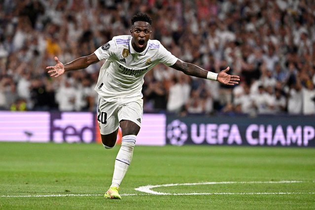 Real Madrid's Brazilian forward Vinicius Junior celebrates after scoring his team's first goal during the UEFA Champions League semi-final first leg football match between Real Madrid CF and Manchester City at the Santiago Bernabeu stadium in Madrid on May 9, 2023. (Photo by Javier Soriano/AFP Photo)