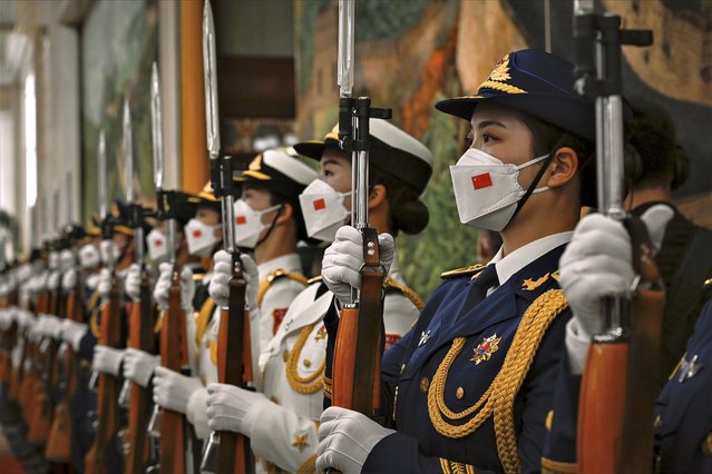 Chinese honor guards prepare for the arrival of Palestinian President Mahmoud Abbas and China's President Xi Jinping at the Great Hall of the People in Beijing Wednesday, June 14, 2023. (Photo by Jade Gao/Pool Photo via AP Photo)