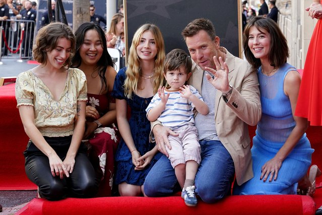 Clara McGregor, from left, Jamyan McGregor, Anouk McGregor, Laurie McGregor, Ewan McGregor, and Mary Elizabeth Winstead attend a ceremony honoring Ewan McGregor with a star on the Hollywood Walk of Fame on Thursday, September 12, 2024, in Los Angeles. (Photo by Jordan Strauss/Invision/AP Photo)