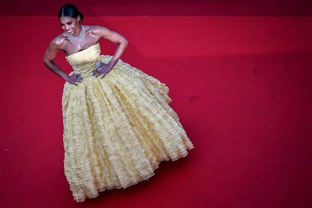 US model Lori Harvey arrives to attend the screening of “Final Cut (Coupez !)” ahead of the opening ceremony of the 75th edition of the Cannes Film Festival in Cannes, southern France, on May 17, 2022. (Photo by Patricia De Melo Moreira/AFP Photo)