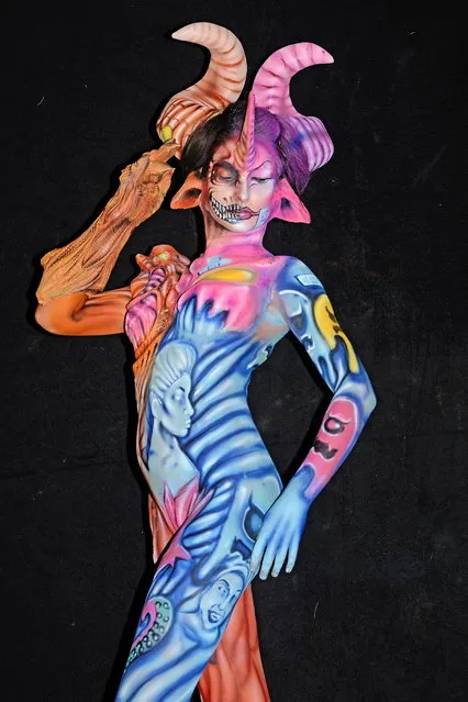 A model poses with her bodypainting designed by bodypainting artist Rudy Campos from Mexic during the 20th World Bodypainting Festival 2017 on July 30, 2017 in Klagenfurt, Austria. (Photo by Didier Messens/Getty Images)
