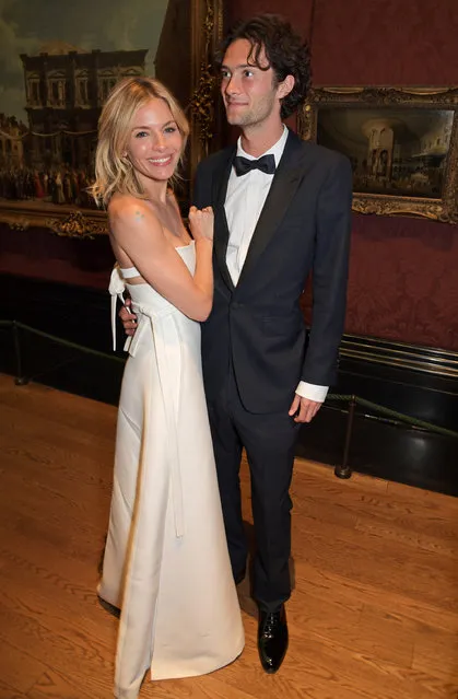 English actress Sienna Miller with her toyboy boyfriend  Oli Green attend “The Alchemist's Feast”, the inaugural summer party & fundraiser for the National Gallery's Bicentenary campaign, NG200, with Creative Director Patrick Kinmonth, on June 23, 2022 in London, England. (Photo by David M. Benett/Getty Images for The National Gallery)