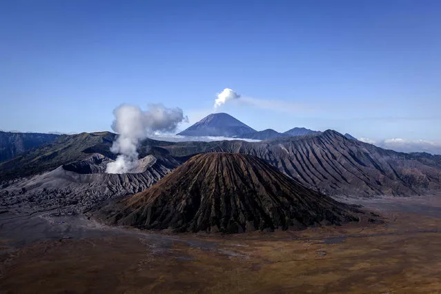 General view of the Bromo Tengger Semeru National Park, with Mount Bromo, the location of the Tenggerese villages where the Tenggerese Hindu Yadnya Kasada Festival is held on August 11, 2014 in Probolinggo, Java, Indonesia. The festival is the main festival of the Tenggerese people and lasts about a month. (Photo by Ulet Ifansasti/Getty Images)