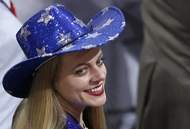 A delegate wears a blue cowboy hat during the third day of the Republican National Convention in Cleveland, Ohio, U.S., July 20 2016. (Photo by Carlo Allegri/Reuters)