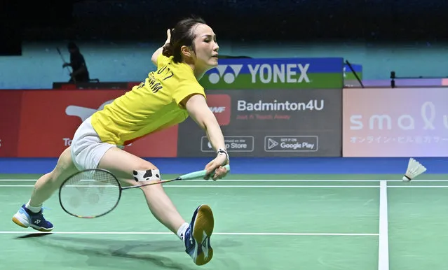 Vu Thi Trang of Vietnam hits a return against Tai Tzu-ying of Taiwan during their women's singles match on day four of the Badminton World Championships in Tokyo on August 25, 2022. (Photo by Richard A. Brooks/AFP Photo)