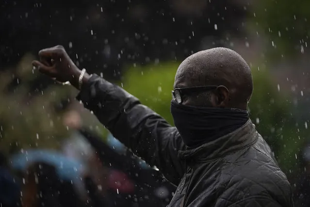 A demonstrator in Hull, the hometown of William Wilberforce MP - leader of the movement to eradicate the slave trade, takes part in a Black Lives Matter protest on June 10, 2020 in Hull, United Kingdom. The death of an African American man, George Floyd, while in the custody of Minneapolis police has sparked protests across the United States, as well as demonstrations of solidarity in many countries around the world. At the weekend, anti-racism protests across the UK resulted in some statues being vandalised. (Photo by Christopher Furlong/Getty Images)