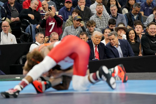 U.S. Senator Dave McCormick (R-PA) speaks with U.S. President Donald Trump, next to Tesla CEO Elon Musk as they attend the NCAA men's wrestling championships in Philadelphia, Pennsylvania, U.S., March 22, 2025. (Photo by Nathan Howard/Reuters)