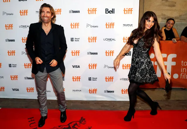 Sharlto Copley arrives with his wife, model Tanit Phoenix, on the red carpet for the film “Free Fire” during the 41st Toronto International Film Festival (TIFF), in Toronto, Canada, September 8, 2016. (Photo by Mark Blinch/Reuters)