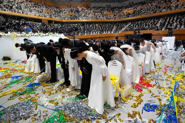 Couples bow during a mass wedding ceremony at the Cheong Shim Peace World Center in Gapyeong, South Korea, Saturday, April 12, 2025. (Photo by Ahn Young-joon/AP Photo)