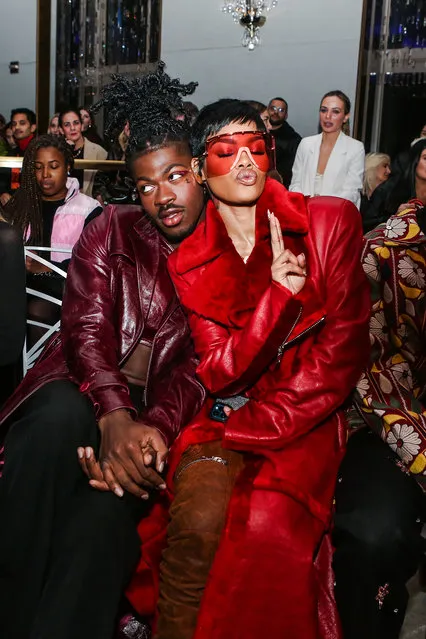 American rapper Lil Nas X and American singer Teyana Taylor in the front row at LaQuan Smith Fall 2023 Ready To Wear Fashion Show at the Rainbow Room at Rockefeller Center on February 13, 2023 in New York, New York. (Photo by Amanda Jones/WWD via Getty Images)