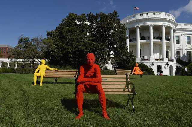 “The Park People Series” by artist Nathan Sawaya is seen on the South Lawn of the White House during the “South By South Lawn”, SXSL festival on October 3, 2016 in Washington, DC. (Photo by Olivier Douliery/AFP Photo)