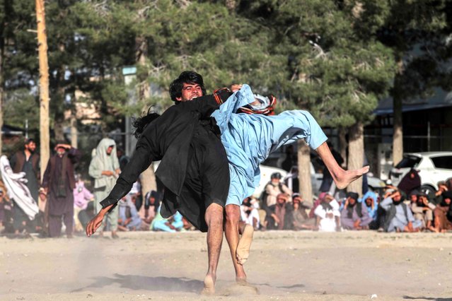 Afghan wrestlers fight in a makeshift wrestling arena in Kabul, Afghanistan, 12 June 2025. Spectators gathered to support their favorite wrestlers from provinces across Afghanistan, during these unofficial competitions. (Photo by Samiullah Popal/EPA)