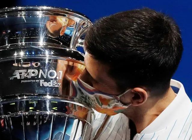 Novak Djokovic of Serbia kisses his ATP World No. 1 trophy at the ATP World Tour Finals 2020 in London, Britain, on November 15, 2020. (Photo by Paul Childs/Action Images via Reuters)