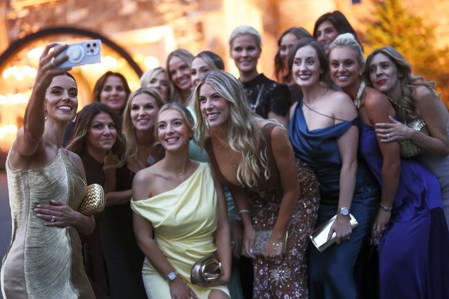 Diane Donald, wife of Captain Luke Donald of Team Europe takes a selfie with other partners of Team Europe during the Ryder Cup Teams' Welcome Dinner prior to the Ryder Cup 2025 at Hempstead House on September 23, 2025 in Sands Point, New York. (Photo by Carl Recine/Getty Images)