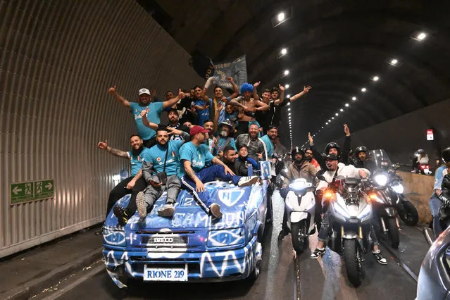Fans of Napoli celebrate their side's third-ever league title victory, the Scudetto, after winning the Serie A soccer match between SSC Napoli and ACF Fiorentina in Naples, Italy, 07 May 2023. (Photo by Ciro Fusco/EPA/EFE)