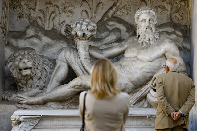 Visitors view a sculpture during the presentation of the restoration of the Nymphaeum and fountains at the National Etruscan Museum of Villa Giulia in Rome, Italy, 11 October 2024. The 16th-century Villa Giulia, which now houses the Museo Nazionale Etrusco, used to be a papal summer residence. The Nymphaeum, part of the Villa Giulia gardens, reopened to the public after a ten-year closure on 05 October 2024. (Photo by Fabio Frustaci/EPA)