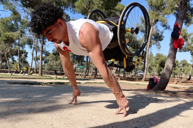 Jordanian athlete Abdul Rahman Makhlouf, 19-year-old, who hopes to achieve a Guinness World Record one day, practices calisthenics in a wheelchair, in Amman, Jordan, on January 30, 2025. (Photo by Jehad Shelbak/Reuters)
