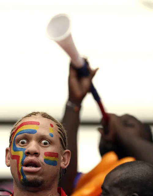 A Democratic Republic of Congo soccer fan gestures during the African Cup of Nations quarter final soccer match between Congo and DR Congo in Bata, Equatorial Guinea, Saturday, January 31, 2015. (Photo by Themba Hadebe/AP Photo)