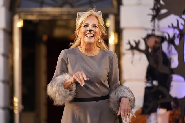 First lady Jill Biden, dressed as her cat, Willow, arrives with President Joe Biden to give treats to trick-or-treaters on the South Lawn of the White House, on Halloween, Monday, October 30, 2023. (Photo by Andrew Harnik/AP Photo)