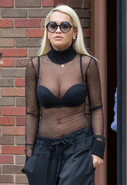 British singer Rita Ora stops by a radio station in New York City, New York on August 11, 2015. Rita was promoting her new single “Body On Me” featuring Chris Brown. Rita showed off her body in a sheer black turtleneck, black bra, and black trousers. (Photo by FameFlynet/Splash News and Pictures)