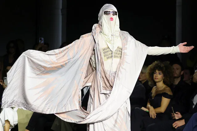 A model presents a creation by designer Andreas Kronthaler as part of his Spring/Summer 2024 Women's ready-to-wear collection show for fashion house Vivienne Westwood, during Paris Fashion Week in Paris, France on September 30, 2023. (Photo by Johanna Geron/Reuters)