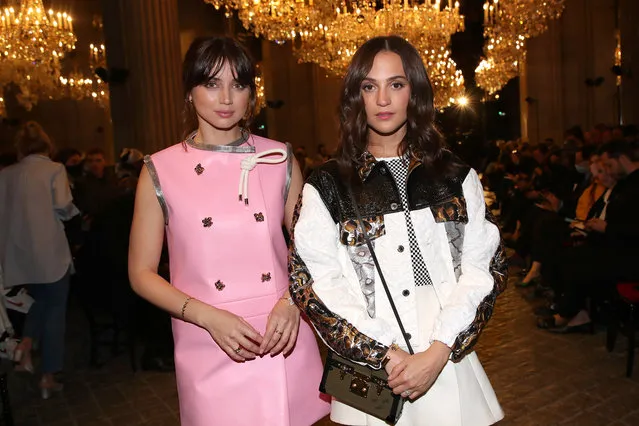 Cuban-Spanish actress Ana de Armas and Swedish actress Alicia Vikander attend the Louis Vuitton Womenswear Spring/Summer 2022 show as part of Paris Fashion Week on October 05, 2021 in Paris, France. (Photo by Bertrand Rindoff Petroff/Getty Images)