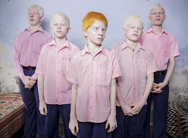 1st prize in the People Staged Portraits Single category. Brent Stirton, South Africa, for Reportage by Getty Images. The photo shows a group of blind albino boys in their boarding room at the Vivekananda mission school for the blind in West Bengal, India, September 25, 2013. (Photo by Brent Stirton/World Press Photo)