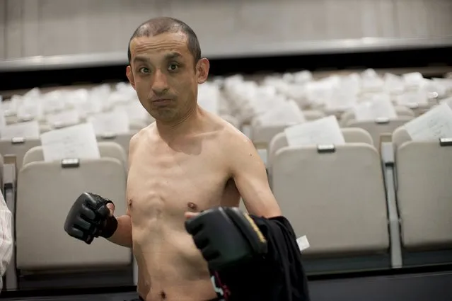 “Sambo” Shintaro, Doglegs co-founder, and star of the documentary film Doglegs, strikes a fighting pose in Japan in this April 29, 2011 handout photo. Filmmaker Heath Cozens hopes to smash stereotypes about the disabled with his new documentary Doglegs, about a handicapped pro-wrestling league in Japan. (Photo by Alfie Goodrich/Reuters)