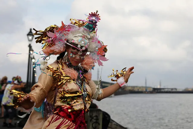 A woman celebrates Mardi Gras outside the French Quarter along the Mississippi river bank in New Orleans, Louisiana U.S., February 28, 2017. (Photo by Shannon Stapleton/Reuters)