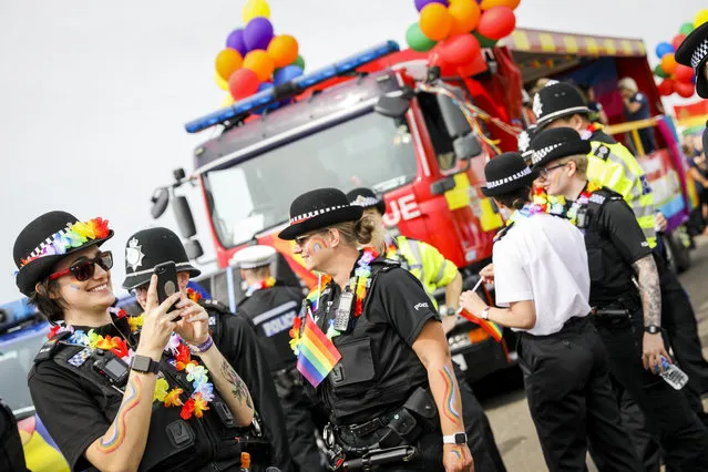 Police officers during Brighton Pride Parade on August 03, 2019 in Brighton, England. Tens of thousands of revellers dressed in rainbow colours and elaborate costumes and descended on the seaside city to ask for equality for all. (Photo by Tristan Fewings/Getty Images)