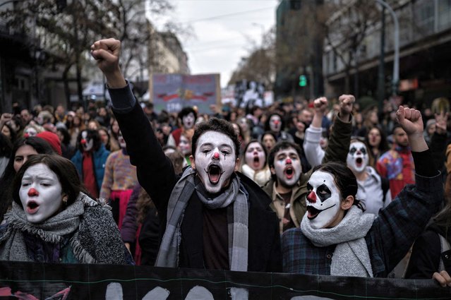 Art students demonstrate in Athens on February 15, 2023 during a protest of Greek performing artists over legislative changes that put them on a par with school leavers for state pay and qualifications. (Photo by Angelos Tzortzinis/AFP Photo)