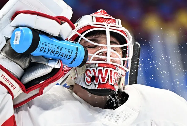 Andrea Braendli drinks at break during the ice hockey women's quarterfinals between Switzerland and ROC at Wukesong Sports Centre in Beijing, capital of China, February 12, 2022. (Photo by Xinhua News Agency/Rex Features/Shutterstock)