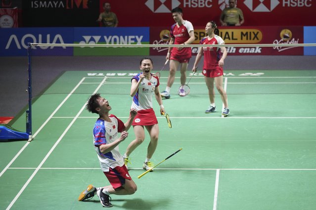 China's Jiang Zhen Bang, left, and Wei Ya Xin celebrate after defeating their compatriots Zheng Si Wei, top left, and Huang Ya Qiong during their mixed doubles final match at the Indonesia Open badminton tournament at Istora Stadium in Jakarta, Indonesia, Sunday, June 9, 2024. (Photo by Tatan Syuflana/AP Photo)