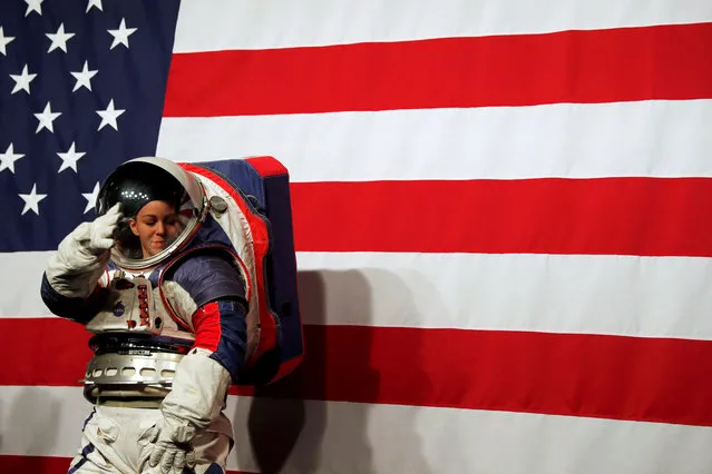 Advanced Space Suit Engineer at NASA Kristine Davis wears the xEMU prototype space suit for the next astronaut to the moon by 2024, during its presentation at NASA headquarters in Washington, U.S., October 15, 2019. (Photo by Carlos Jasso/Reuters)