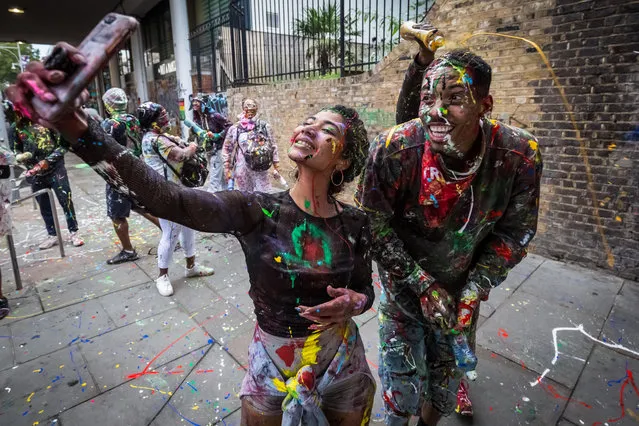 Jouvert parade starts the Notting Hill Carnival 2018 festivities with the traditional “dirty” paint, oil and coloured powder being thrown to the sounds of African drums and rhythm bands in London, England on August 26, 2018. (Photo by Guy Corbishley/Alamy Live News)